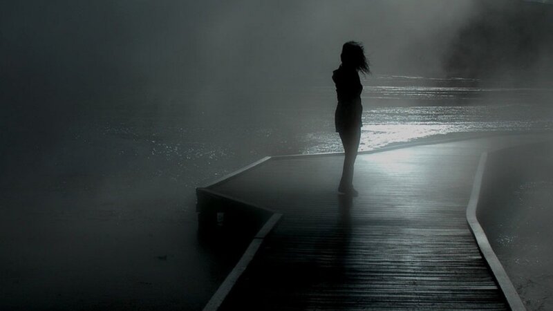 Silhouette of Person on Dock — Black, Dramatic