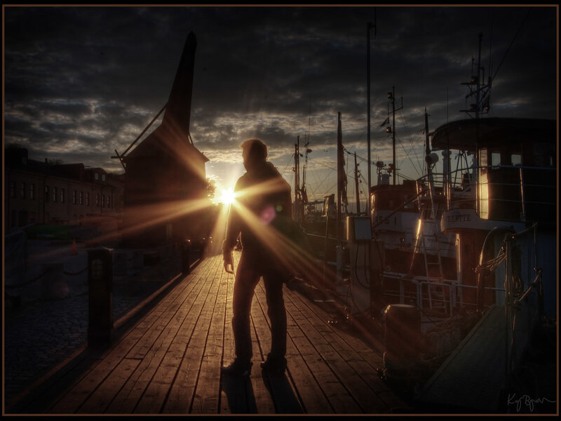 Silhouette of Person on Dock — Brown