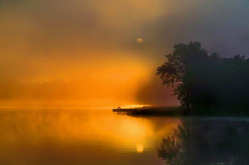 Silhouette of Person on Dock — Orange