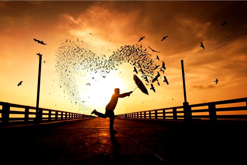 Silhouette of Person on Pier — Orange, Dramatic