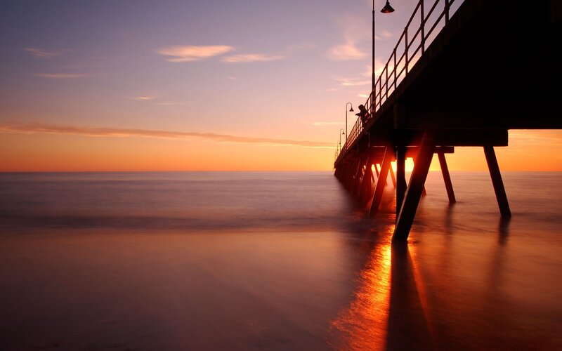 Silhouette of Person on Pier — Orange, Serene, Sunset