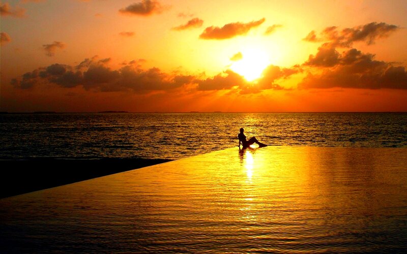 Silhouette of Person on Pool Edge