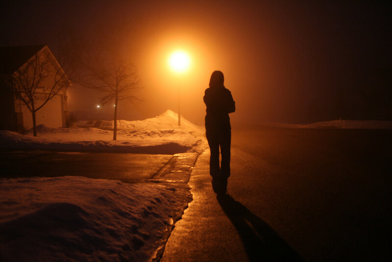 Silhouette of Person on Sidewalk