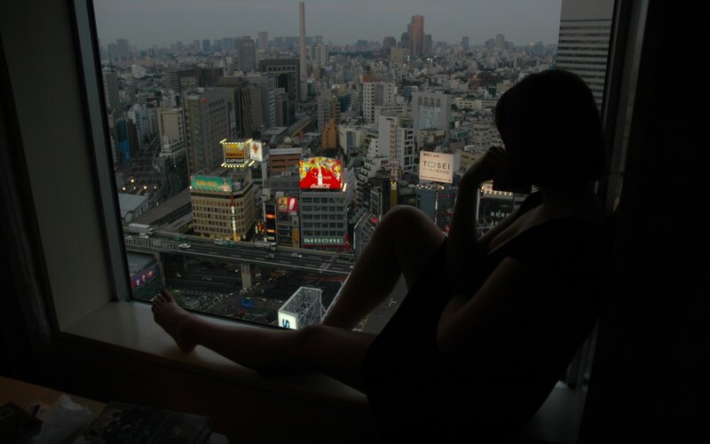 Silhouette of Person on Windowsill