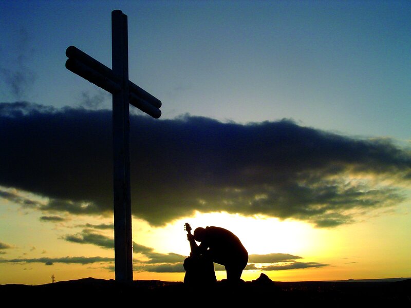 Silhouette of Person Praying — Blue