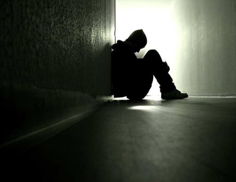 Silhouette of Person Sitting — Black, Dramatic, Photograph, Wall