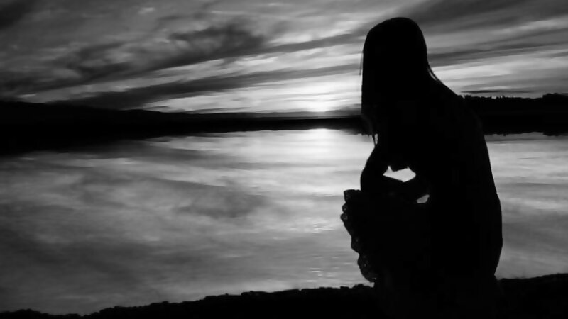 Silhouette of Person Sitting — Black, Dramatic, Sunset