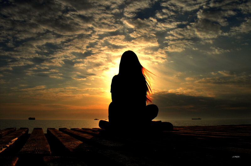 Silhouette of Person Sitting — Orange, Dramatic, Sunset