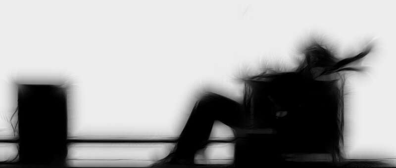 silhouette of person sitting