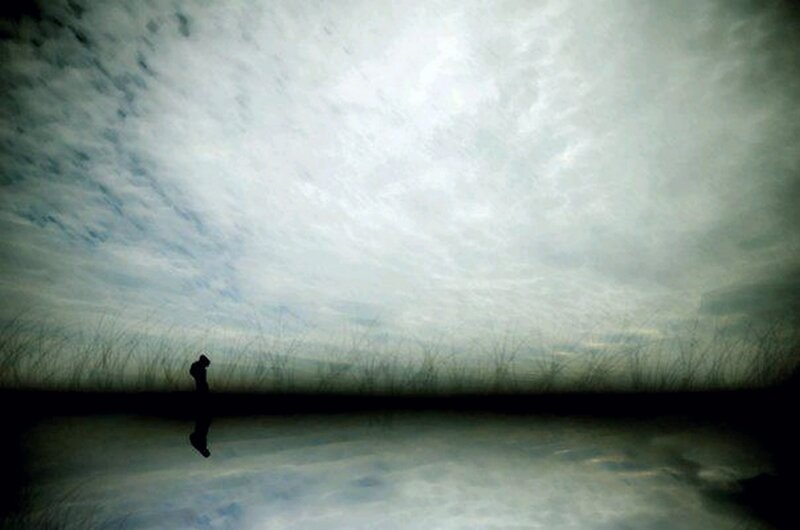 Silhouette of Person Standing — Gray, Dramatic