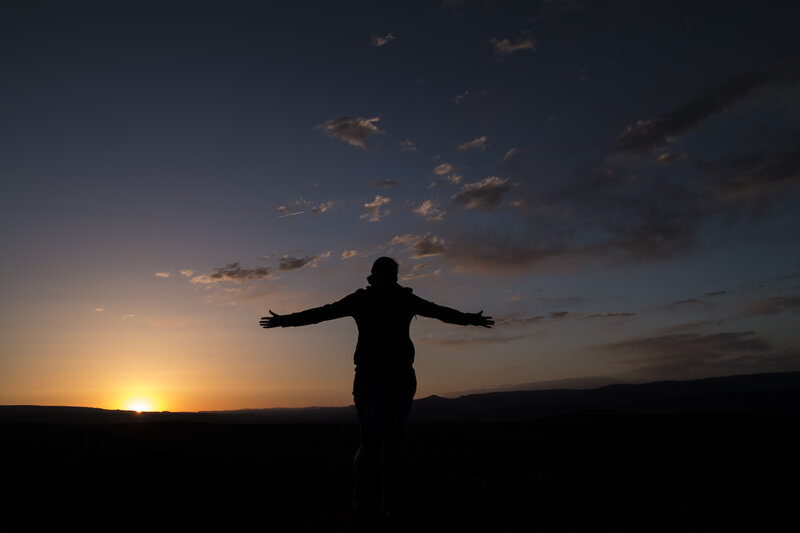 Silhouette of Person Standing — Orange, Serene, Sunrise