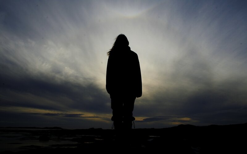 Silhouette of Person Standing