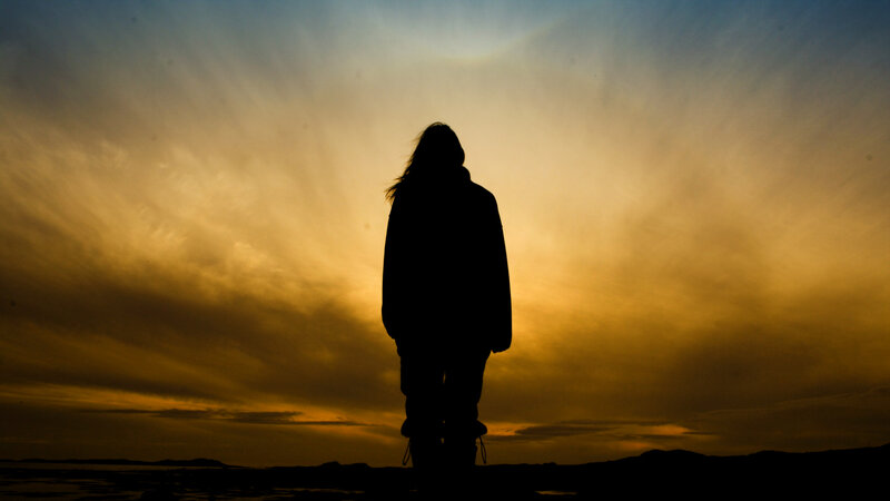 Silhouette of Person Standing — Yellow