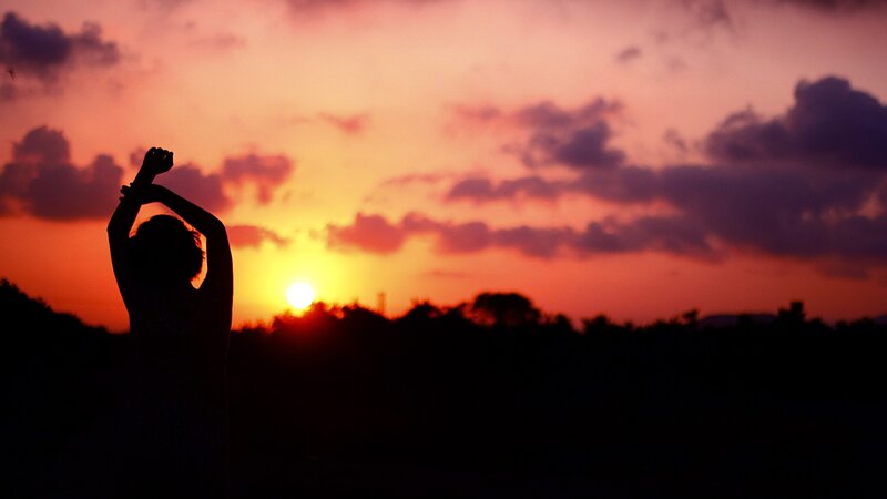 Silhouette of Person Stretching — Orange