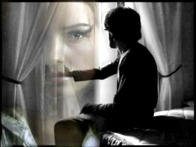Silhouette of Person Touching Face