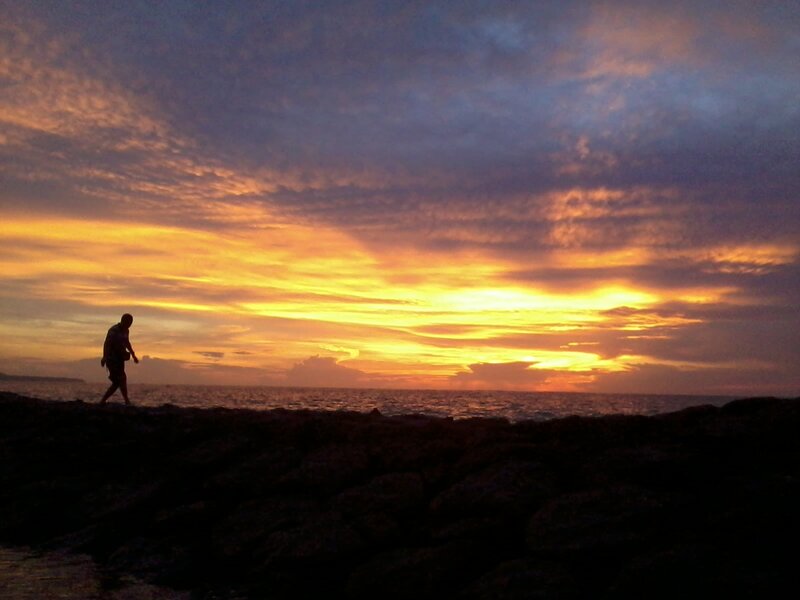 Silhouette of Person Walking — Orange, Dramatic, Sunset