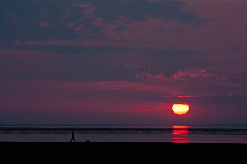 Silhouette of Person Walking — Red