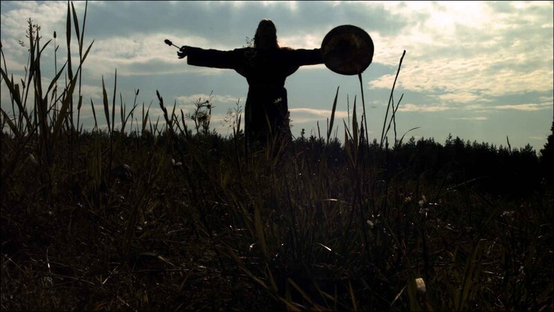 silhouette of person with arms outstretched