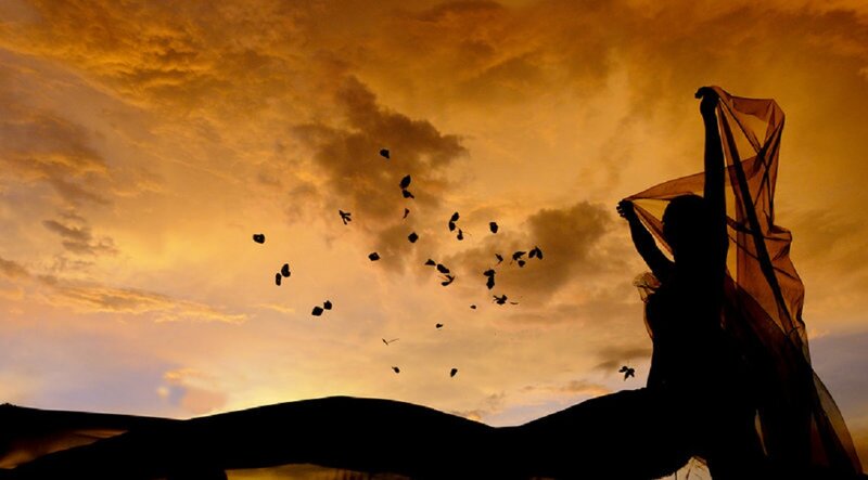 Silhouette of Person with Fabric