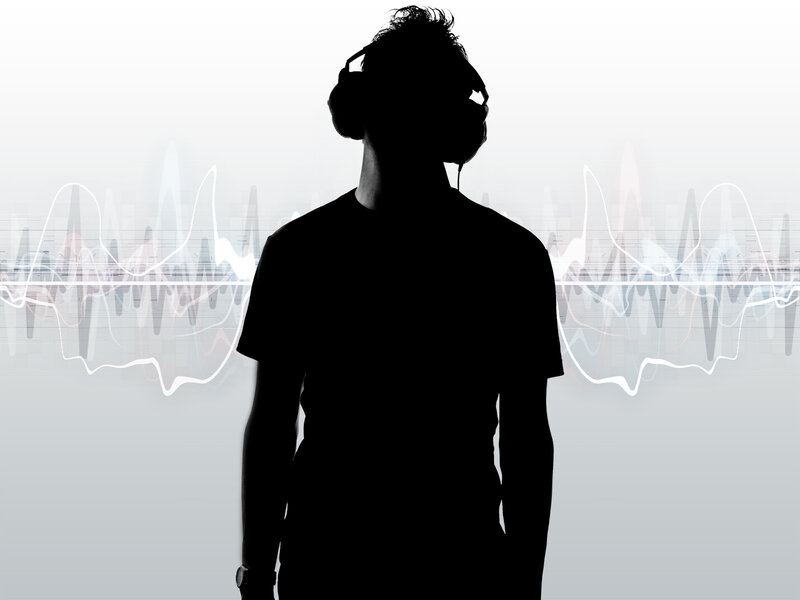 silhouette of person with headphones