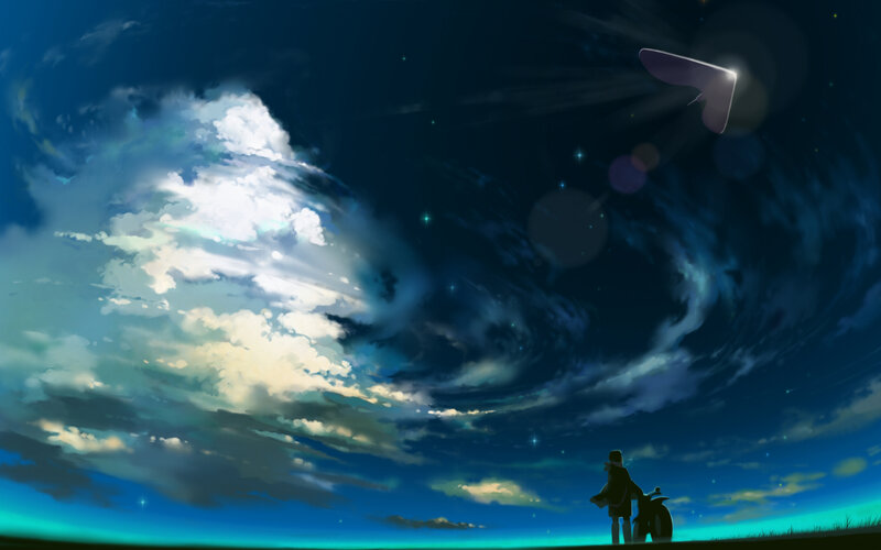 Silhouette of Person with Motorcycle