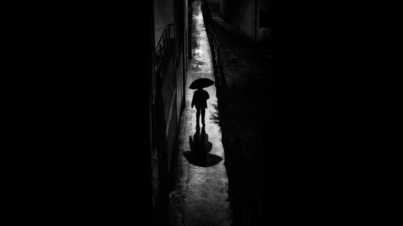 Silhouette of Person with Umbrella — Black, Dramatic, Night, Photograph, Alley