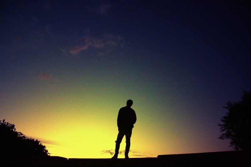 Silhouette of Person — Yellow, Dramatic, Sunset, Photograph, Sky