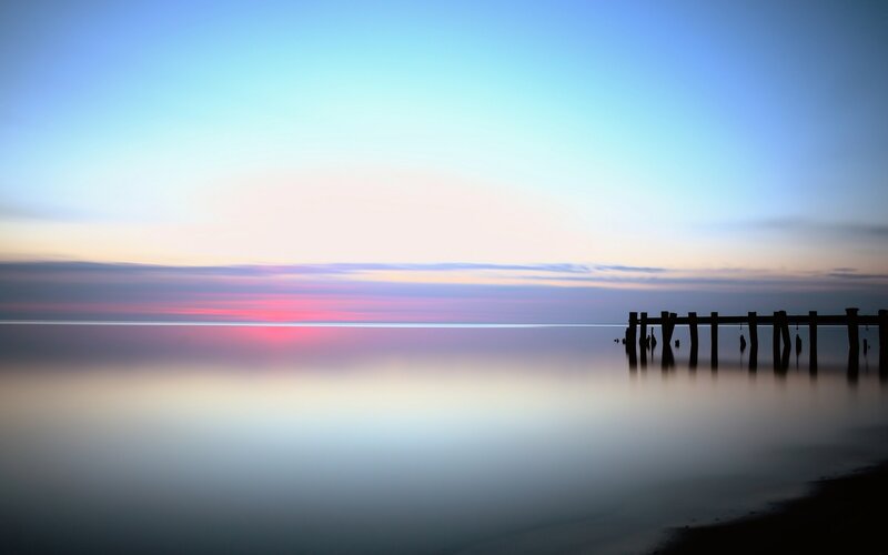 Silhouette of Pier at Sunset — Blue, Serene, Photograph, Sky