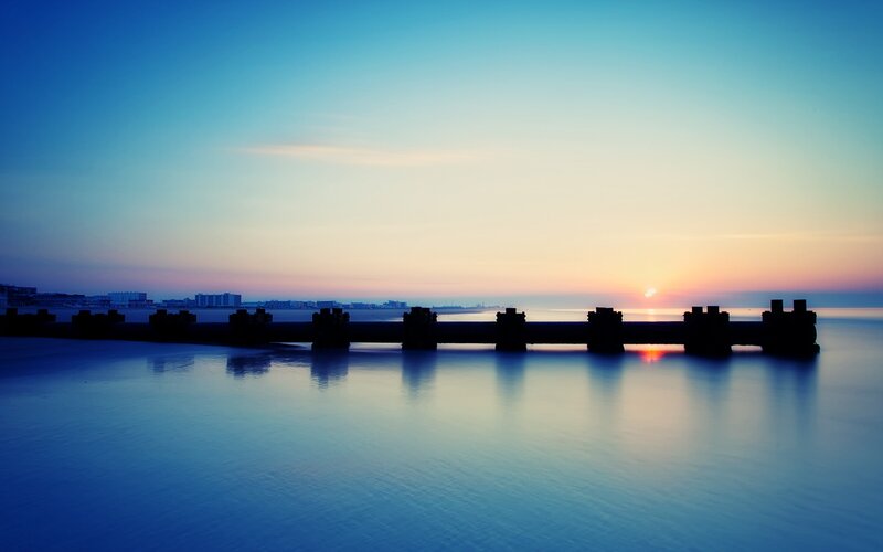 Silhouette of Pier at Sunset — Blue, Serene, Photograph, Sun