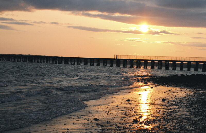 Silhouette of Pier at Sunset — Orange, Serene, Photograph, Ocean, Sun
