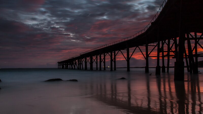 Silhouette of Pier at Sunset — Purple, Dramatic, Photograph, Ocean