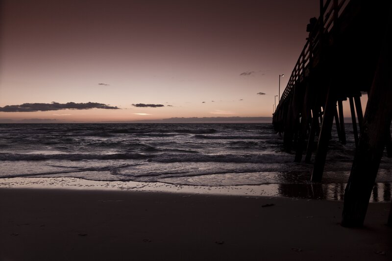 Silhouette of Pier at Sunset — Purple, Serene, Photograph, Ocean