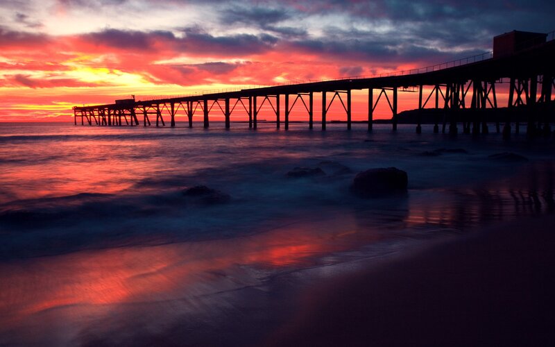 Silhouette of Pier at Sunset — Red, Dramatic, Photograph, Ocean, Sky