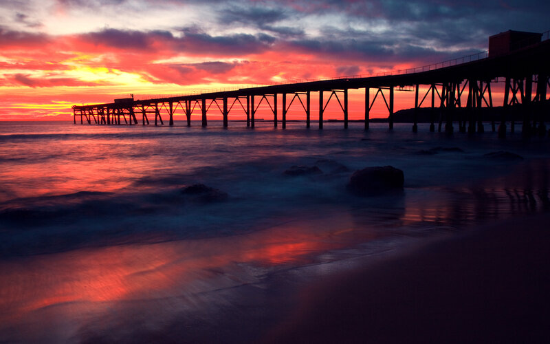 Silhouette of Pier at Sunset — Red