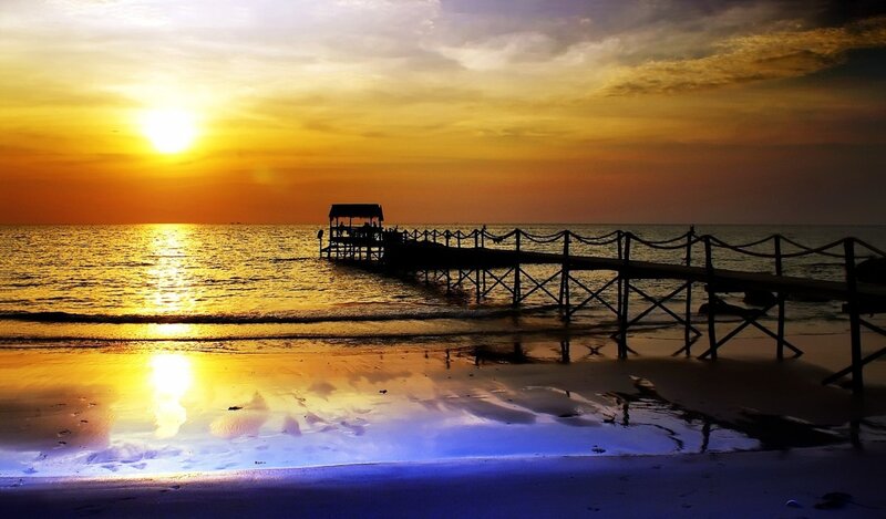 Silhouette of Pier at Sunset — Yellow