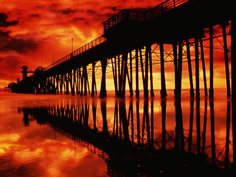 Silhouette of Pier — Red, Dramatic, Sunset
