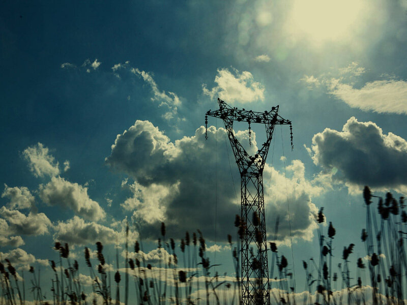 Silhouette of power line tower