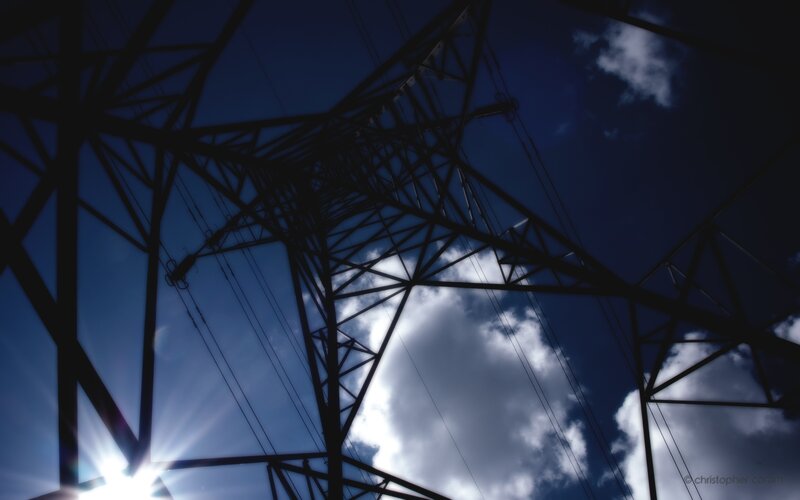 Silhouette of power lines at sunset