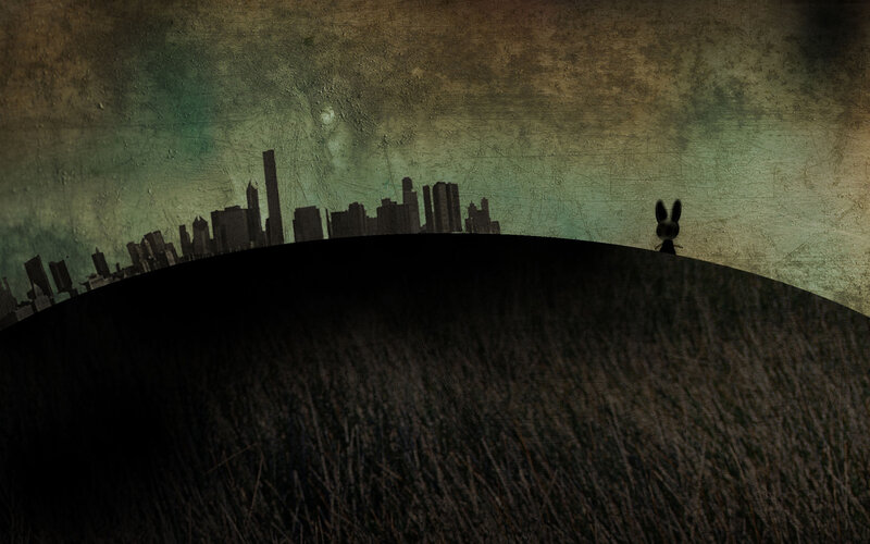 silhouette of rabbit on hill