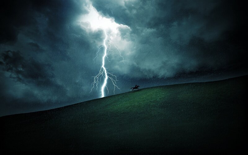 Silhouette of Rider on Hill — Green, Dramatic