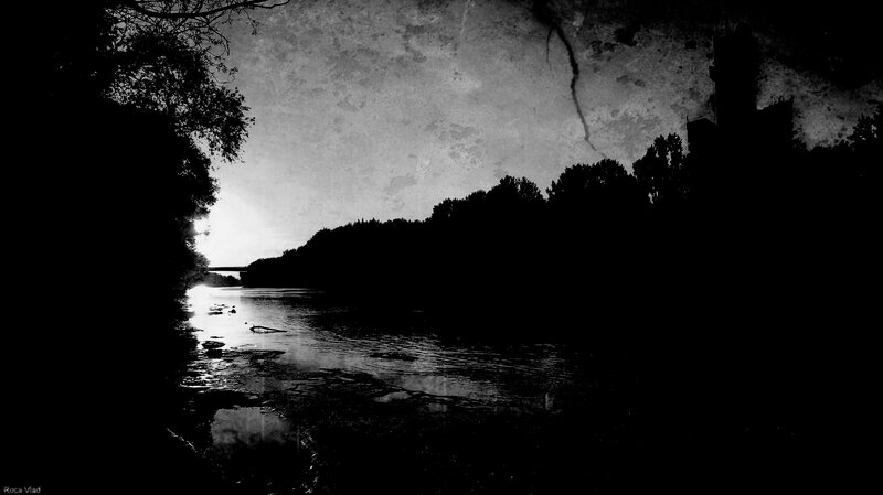 Silhouette of river at sunset