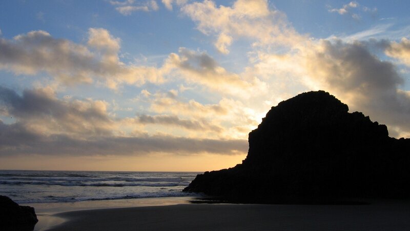 Silhouette of rock at sunset