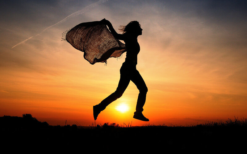 Silhouette of runner at sunset