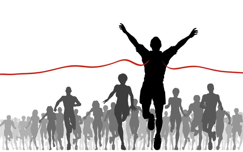 Silhouette of Runner Crossing Finish Line