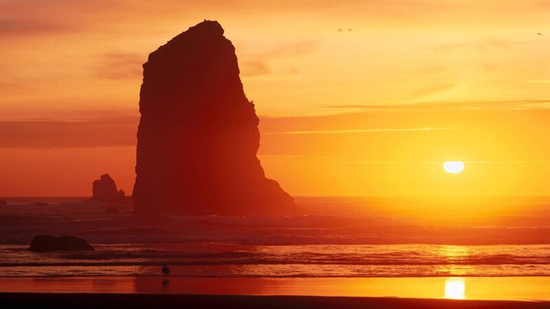Silhouette of Sea Stack — Orange, Serene, Sunset