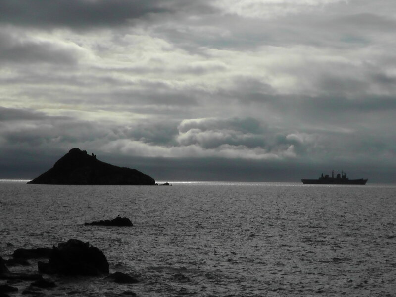 Silhouette of Ship and Island