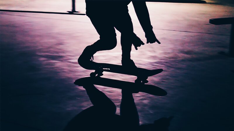 Silhouette of Skateboarder — Purple
