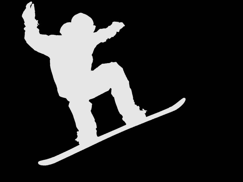 silhouette of snowboarder in action