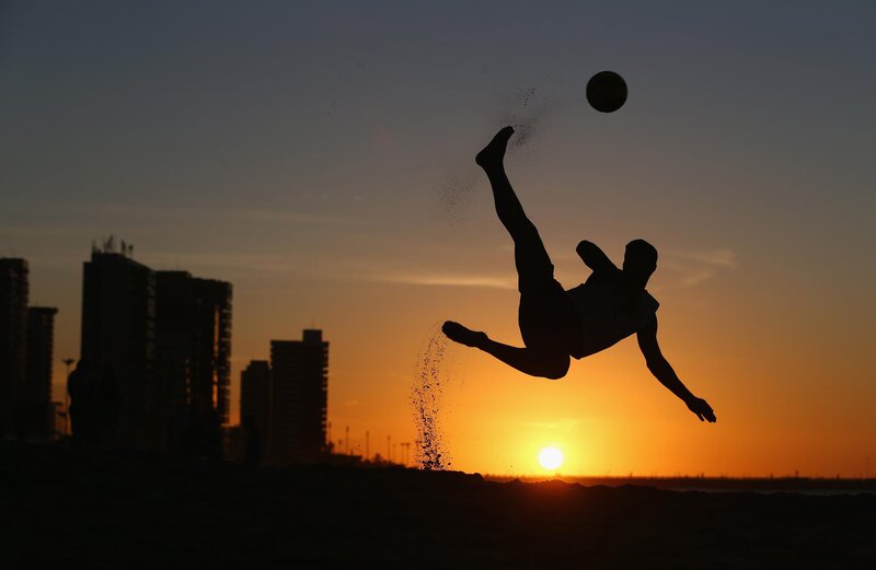 Silhouette of Soccer Player — Orange
