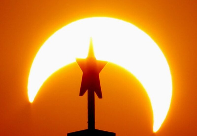 Silhouette of Star and Sun